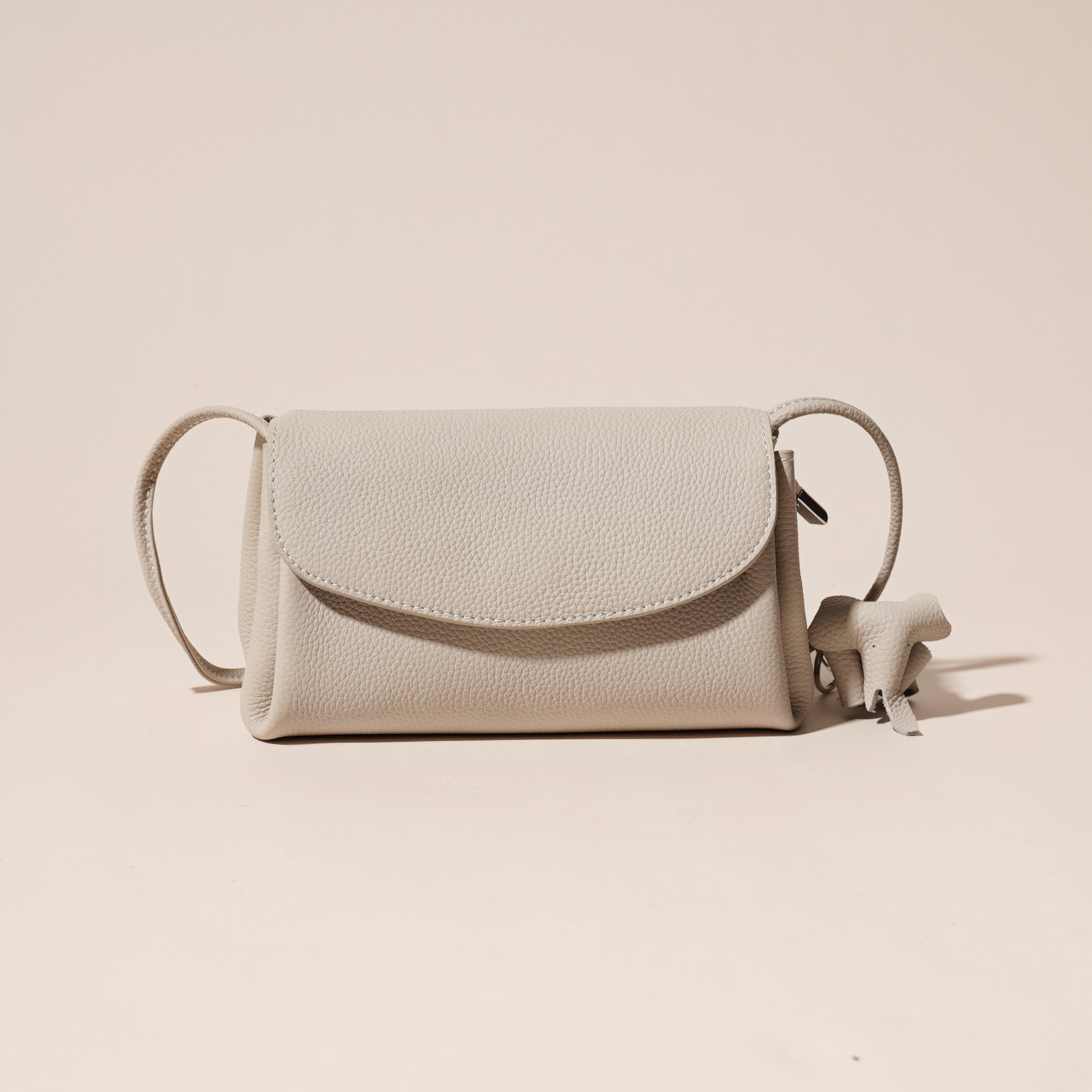 Genuine Leather Flap Crossbody Bag with Elephant Charm - Compact & Stylish