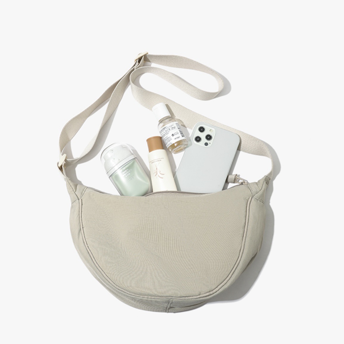 Beige Lightweight Nylon Crossbody Bag – Compact Saddle Style with Adjustable