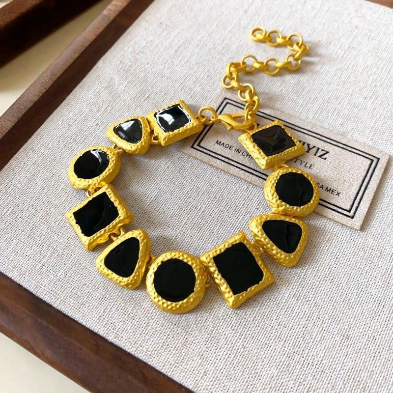 Gold Necklace with Black Stone