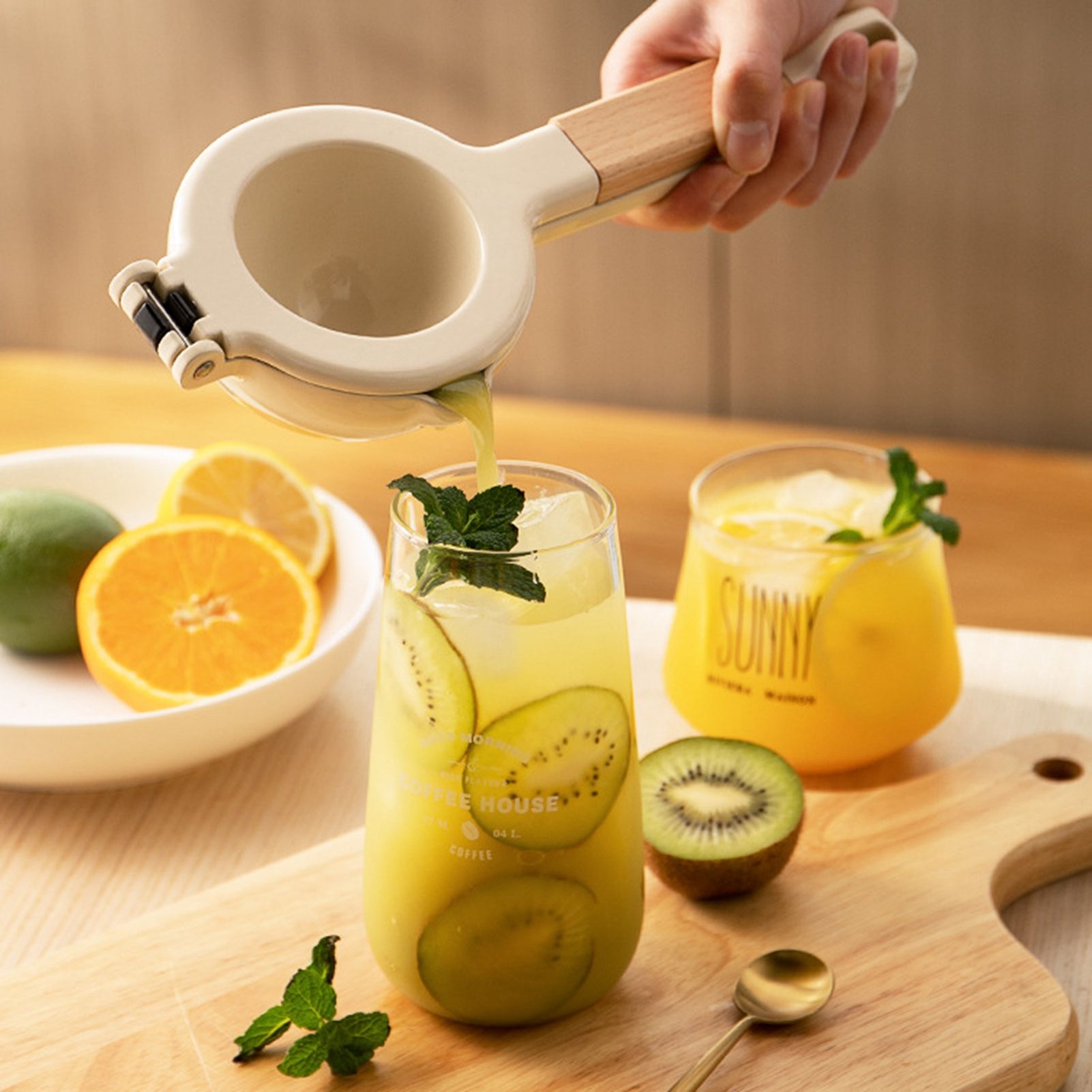 Citrus Juicer Strong Metal Wooden Handle Ergonomic Design Food Grade Coating view 3