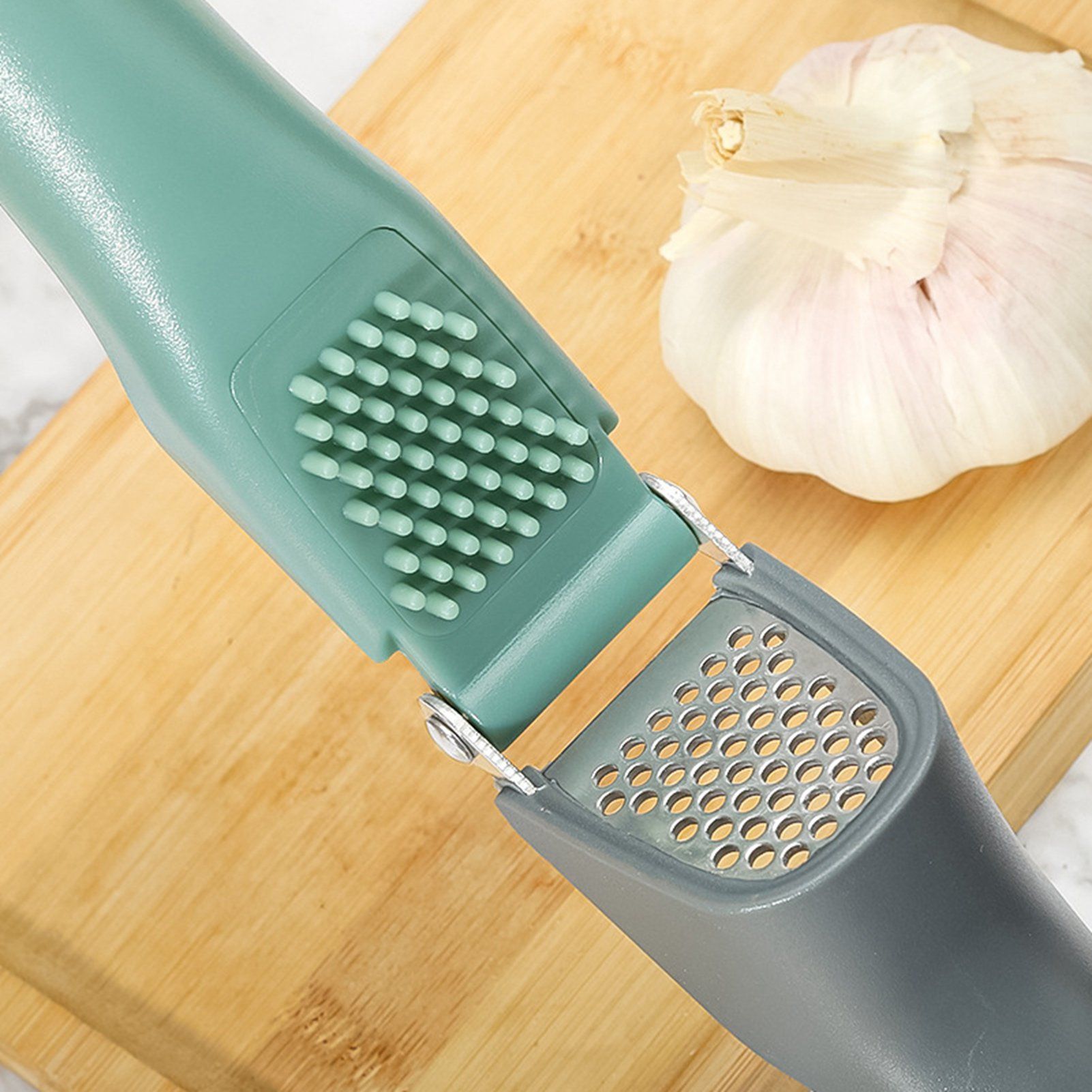 Stainless Steel Garlic Press Manual Easy to Squeeze Clean Garlic Ginger Mincer view 5