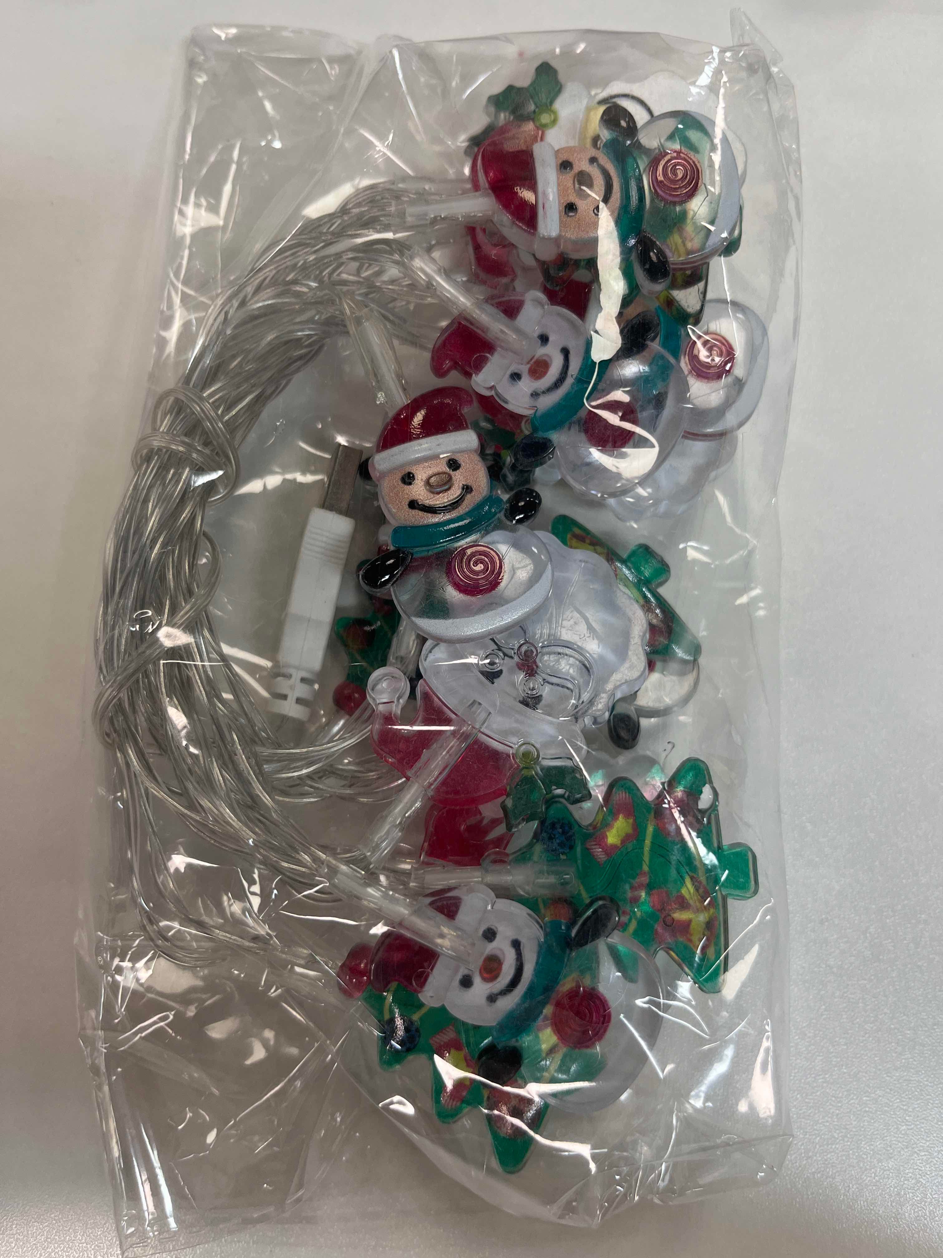 Christmas Light Strings Snowman Santa Christmas Tree Ornaments Festive Window view 10