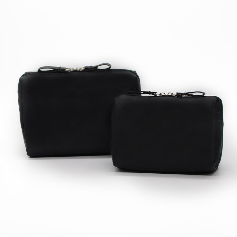 Ai Cheng Space Makeup Bag Travel Storage Hand-held cosmetic bag [black outside