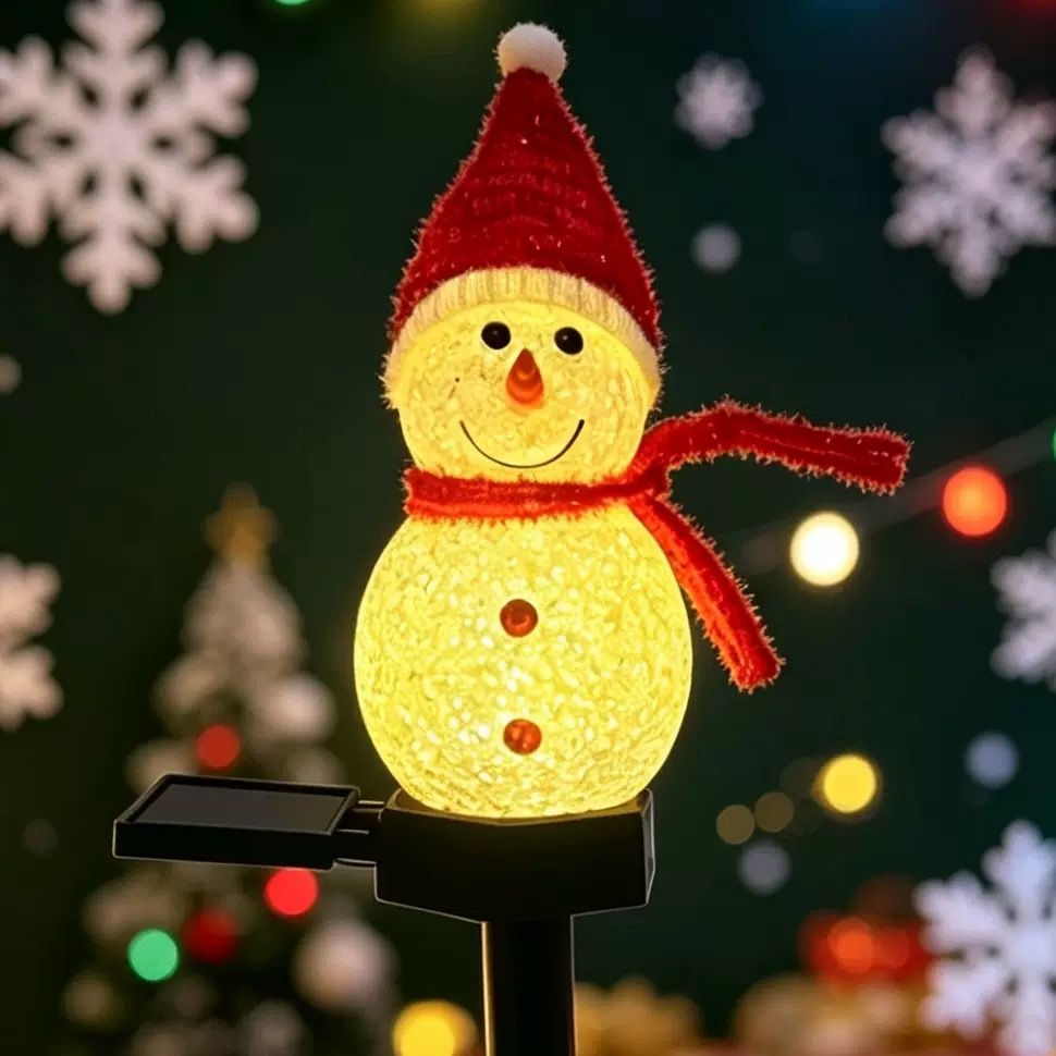 Charming Solar Snowman Stake Lights with Warm Glow — image 1