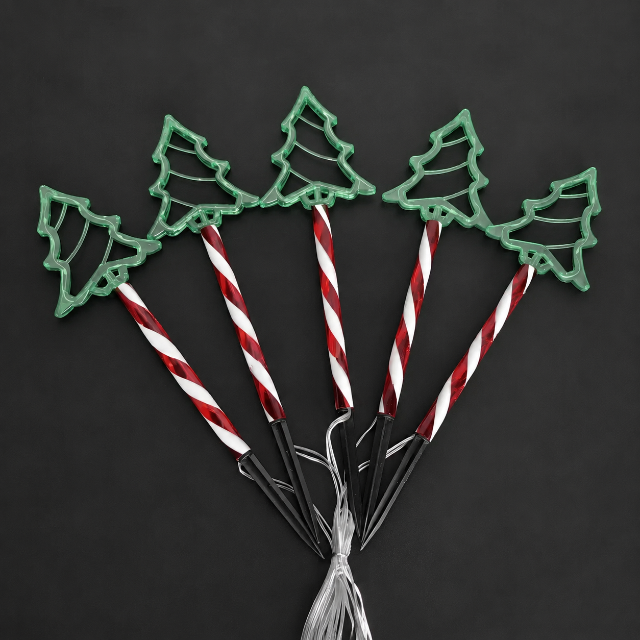 Solar-Powered Christmas Tree Stake Lights with Red-White Spiral Poles — image 1