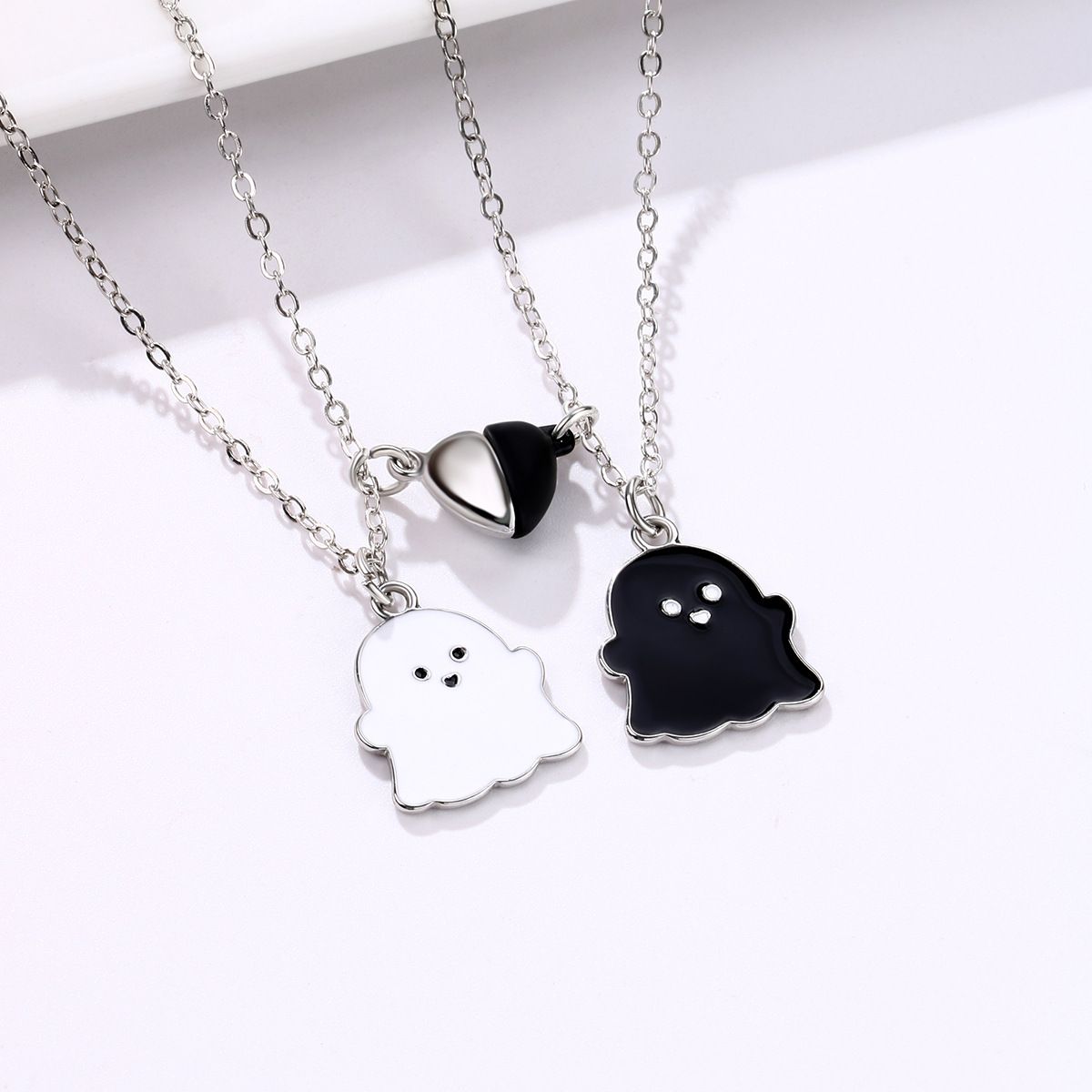 2Pcs Lovely Magnetic Love Heart Ghost Pendant Necklace Set for Women Men Best view 3