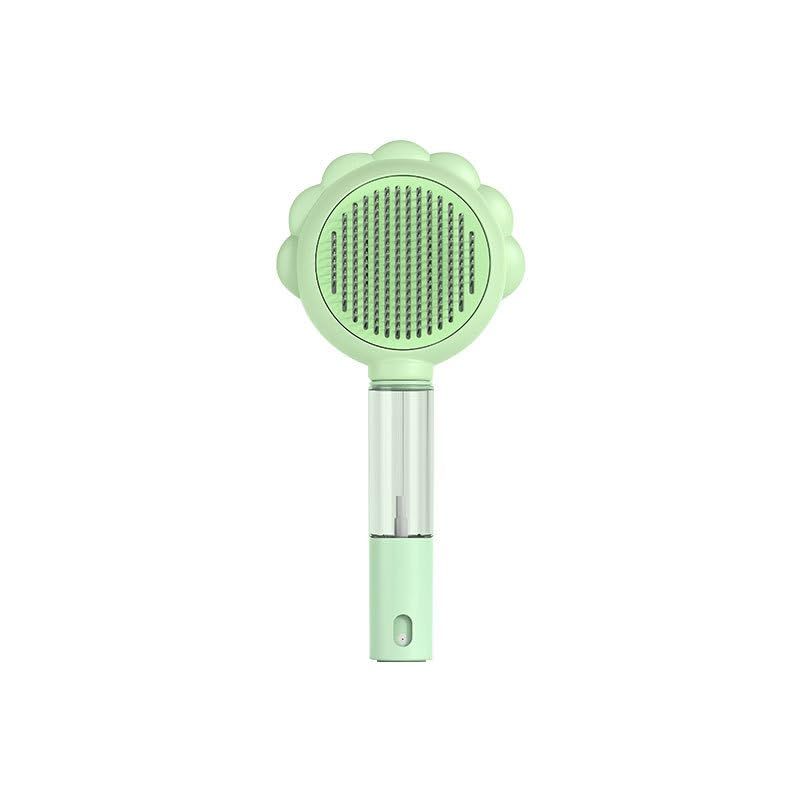 Spray cat brush with release button for indoor cats