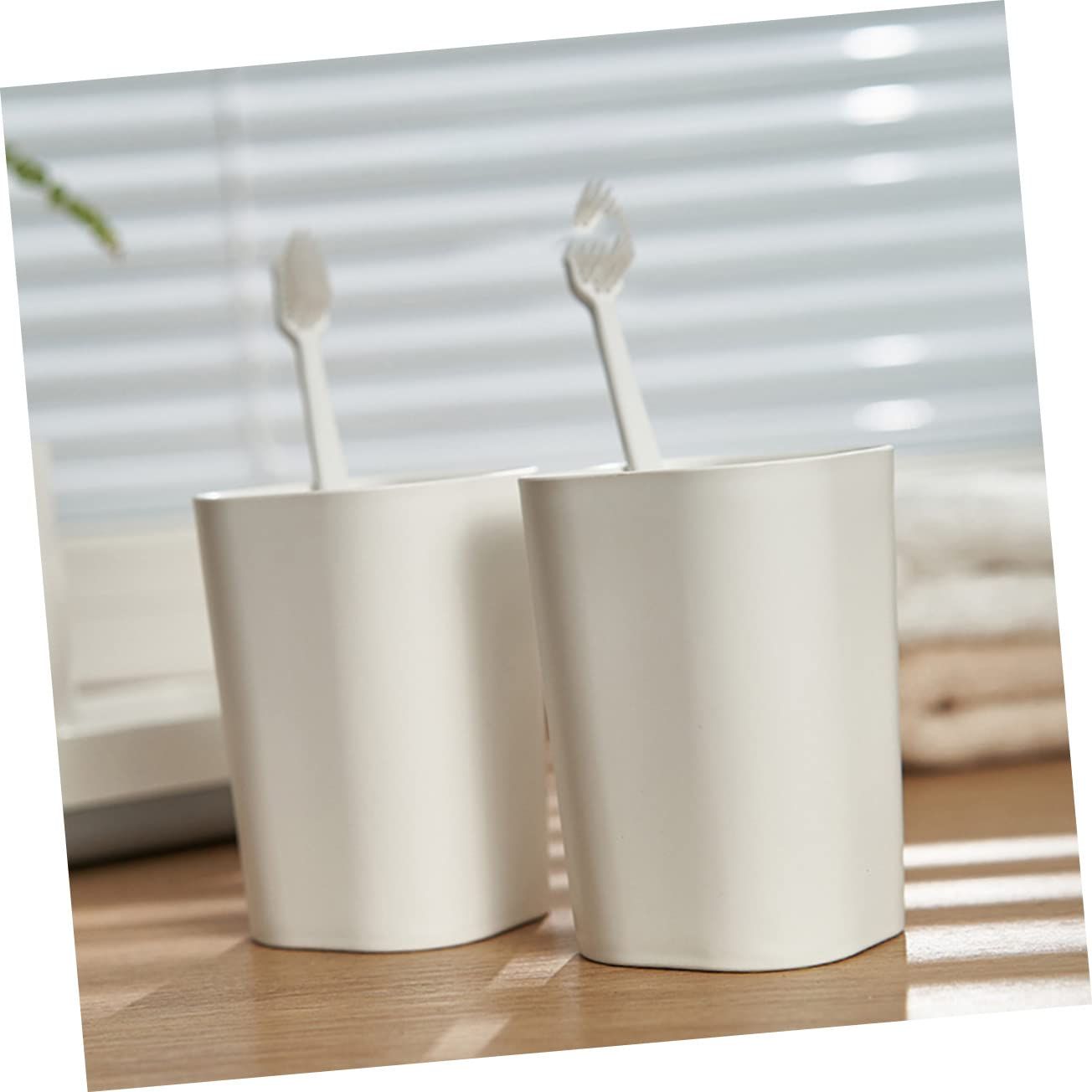 1 toothbrush holder, toothbrush holder, hanger, toothpaste dispenser, bathroom view 3