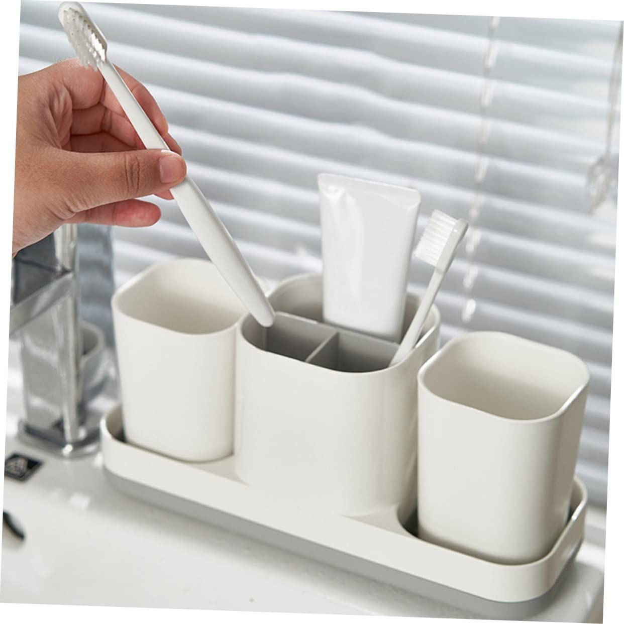 1 toothbrush holder, toothbrush holder, hanger, toothpaste dispenser, bathroom view 4