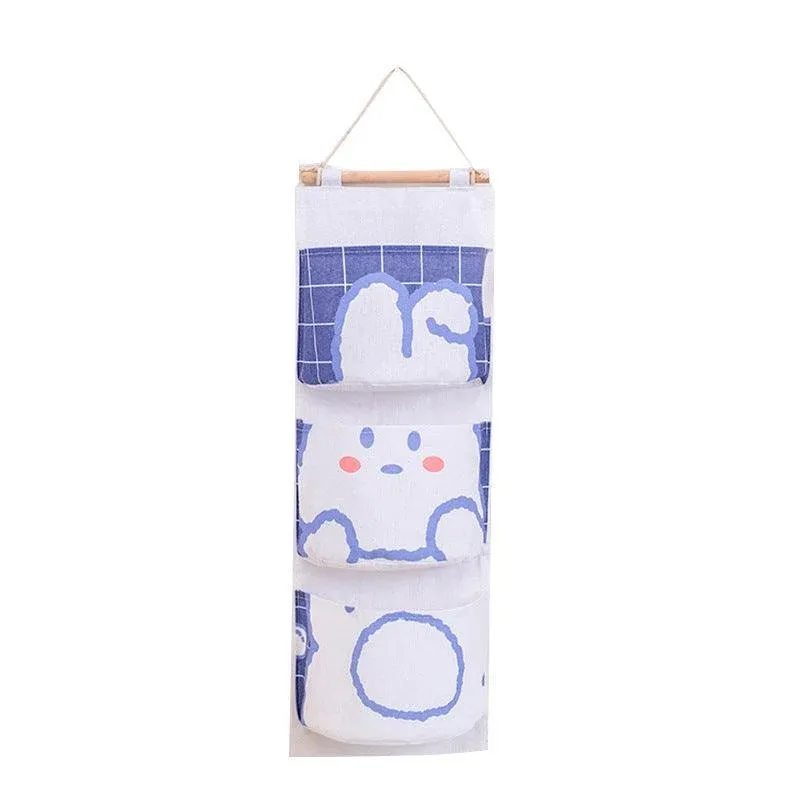 3 Pocket Hanging Storage Bag with Wooden Rod for Wall or Door Organisation — image 1