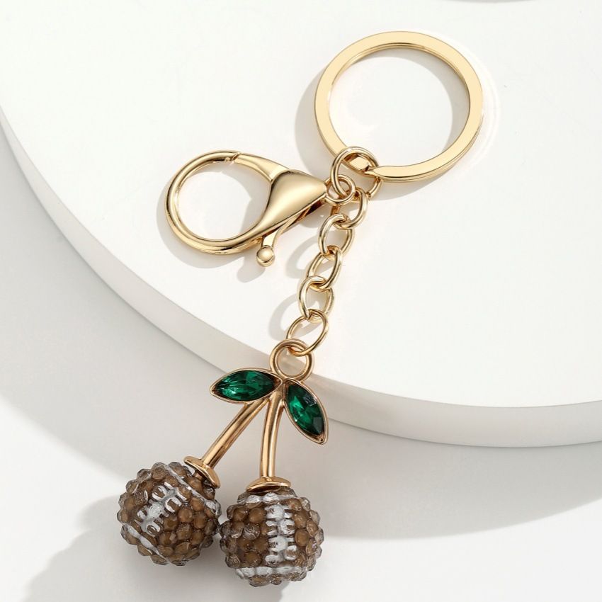 2 Pcs Brown rugby ball shape Creative Sports Ball Cherry Keychain – Cute Resin — image 1