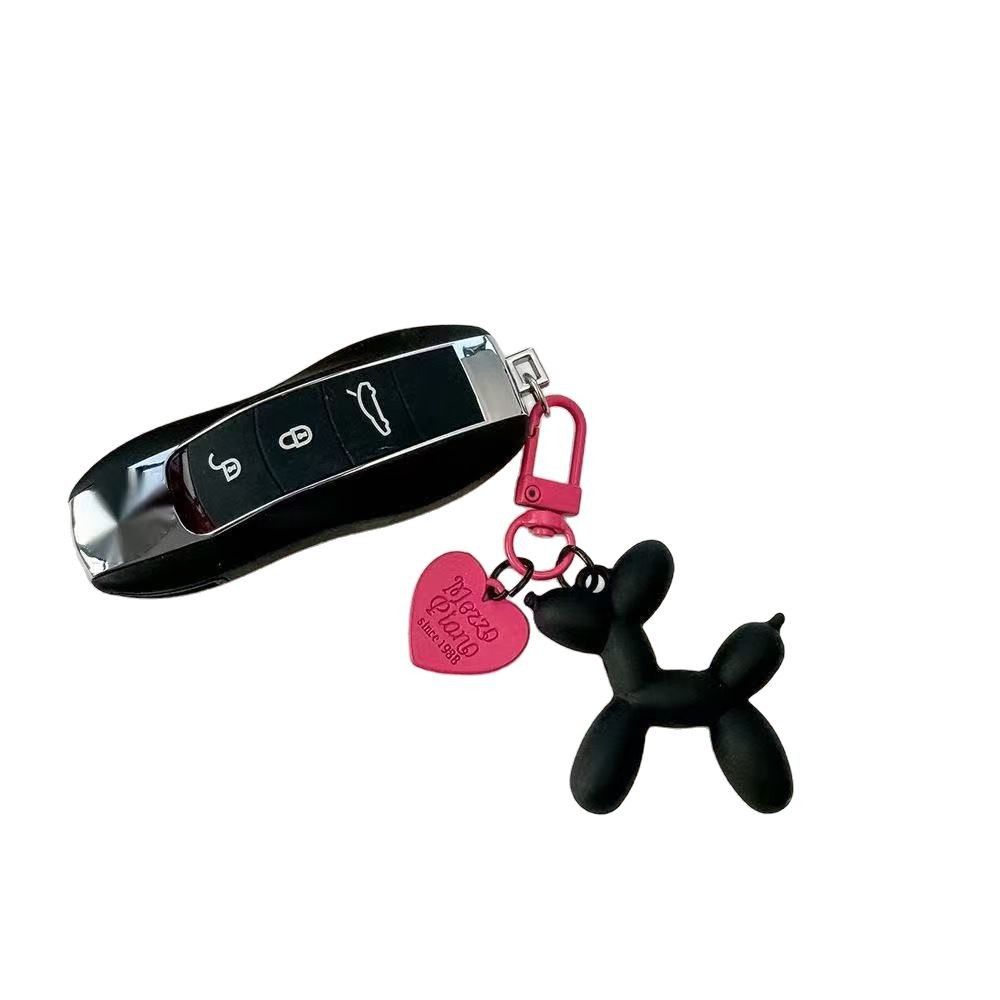 2-Piece White Balloon Dog Keychain Set with Heart Charm Bag Pendant Cute view 2