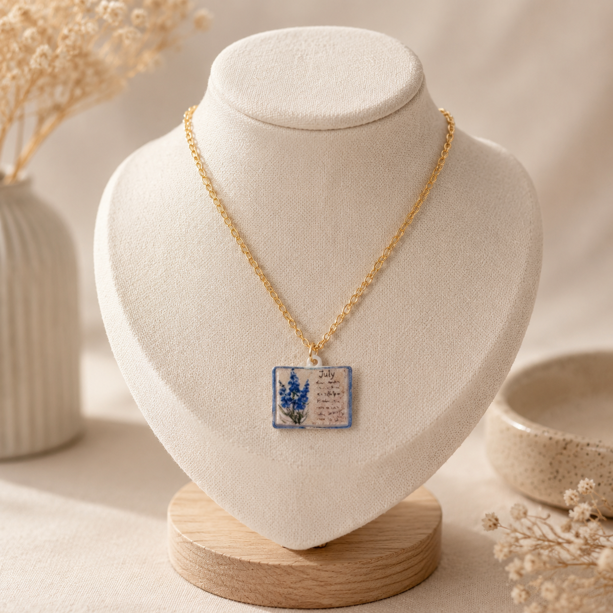 Vintage-style book necklace with July birthday flowers