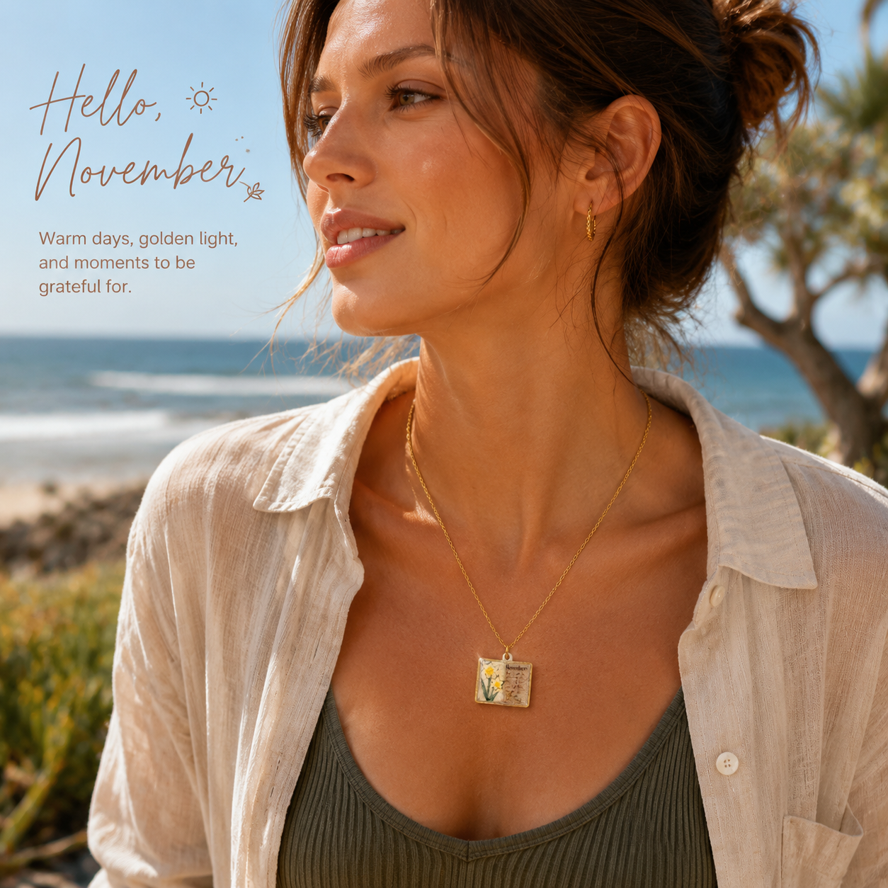 Vintage-style book necklace with November birthday flowers