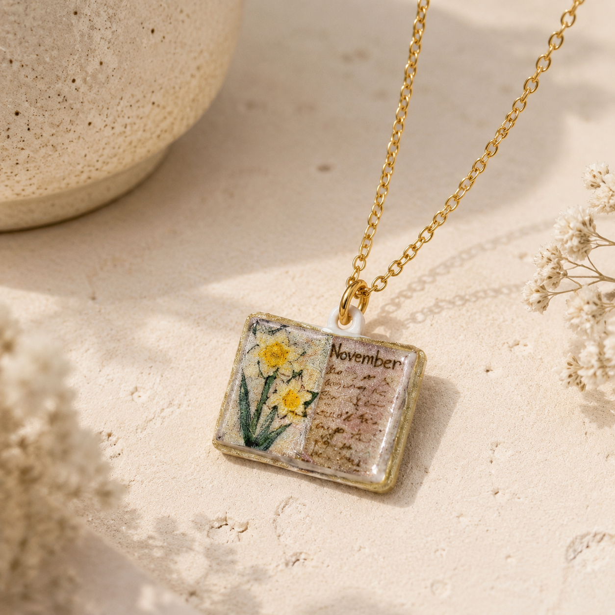 Vintage-style book necklace with November birthday flowers view 2