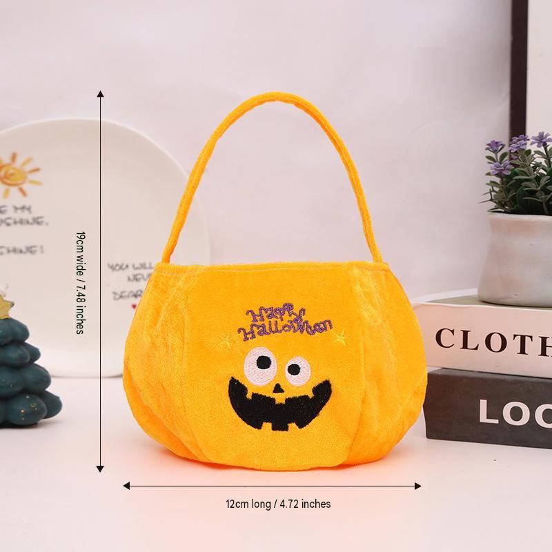 Yellow bag with a pumpkin pattern - Plush Halloween Trick or Treat Candy Bag view 6